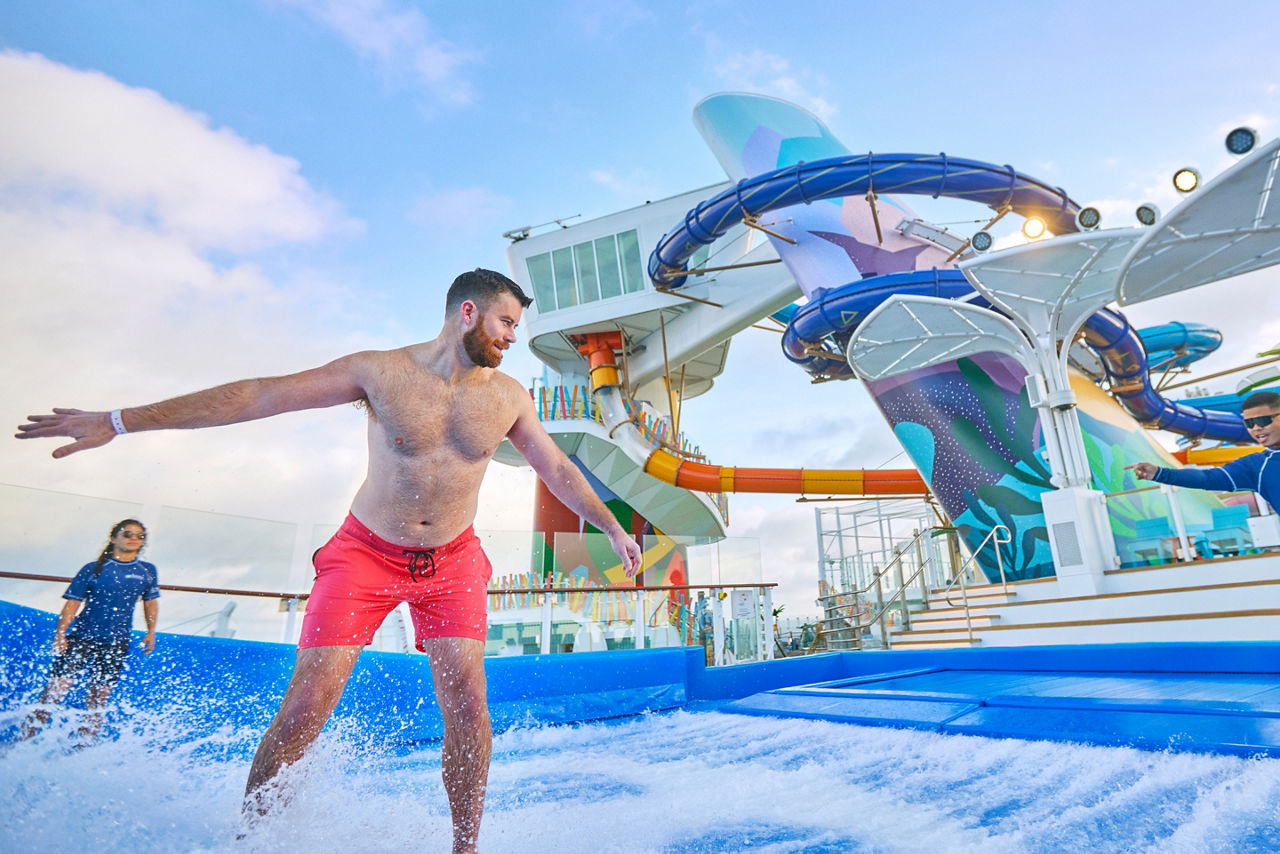 icon of the seas flowrider stand up surf board instructor crop