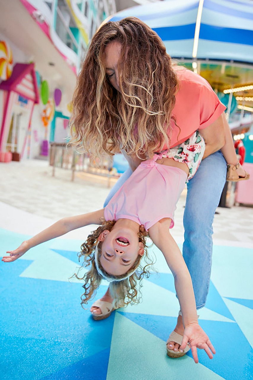 Mom having fun with daughter at Surfside Playscape on Icon of the Seas