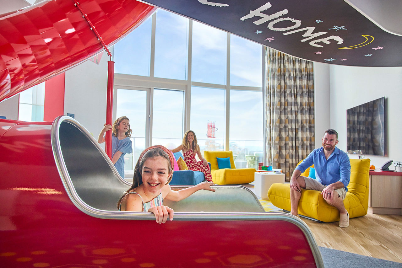 Family Enjoying the Slide at the Ultimate Townhouse