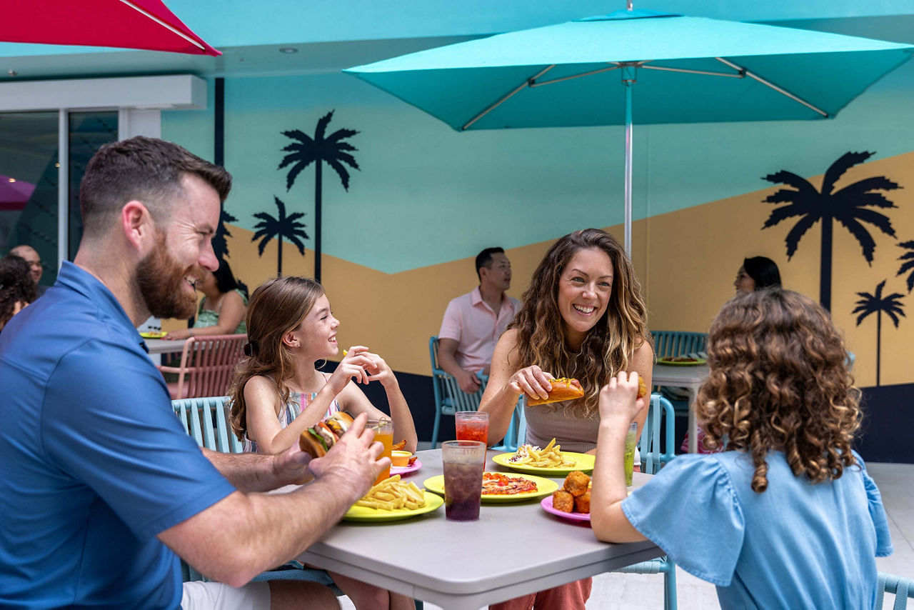 icon of the seas family having chat and eating food