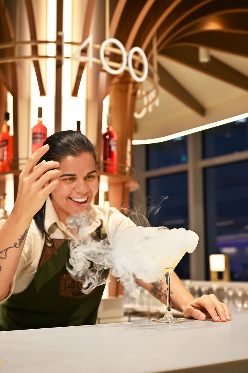 icon of the seas waiter making drink  Lobby 1400 Bar