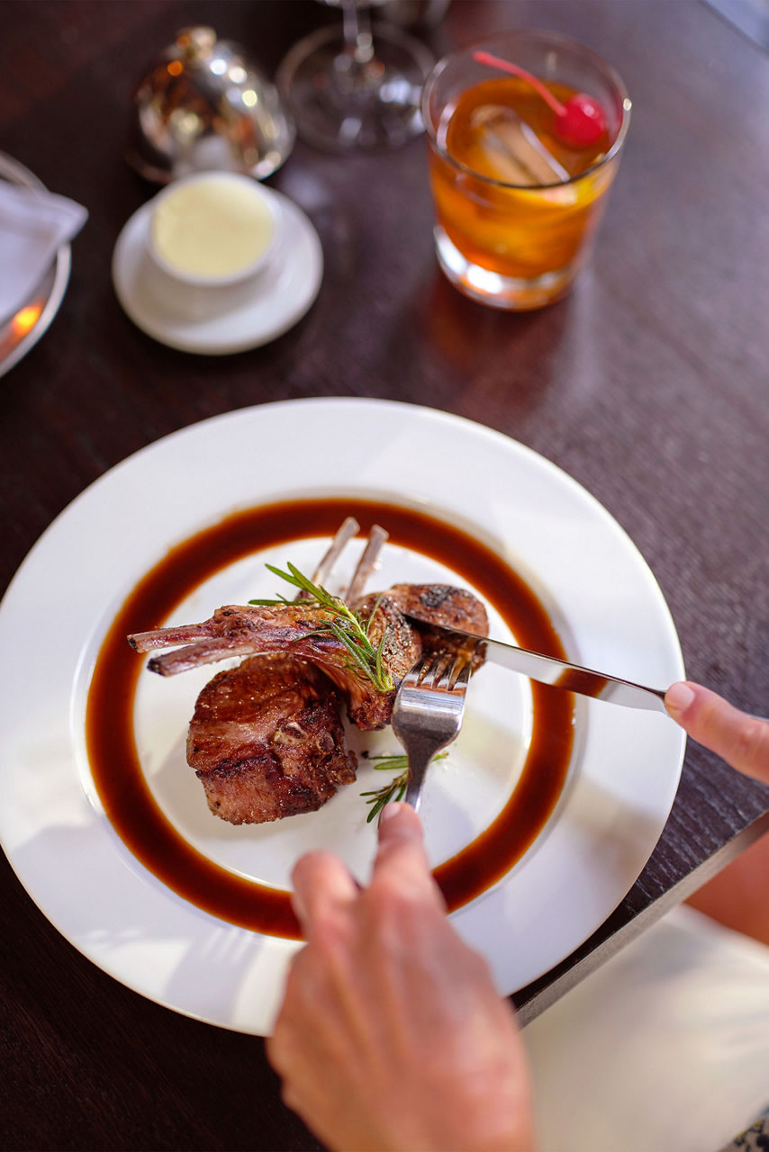Cutting into Chops Grille dish
