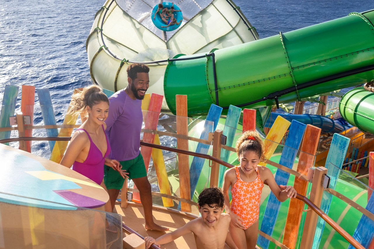 family walking up stairs thrills waterpark storm surge star of the seas square