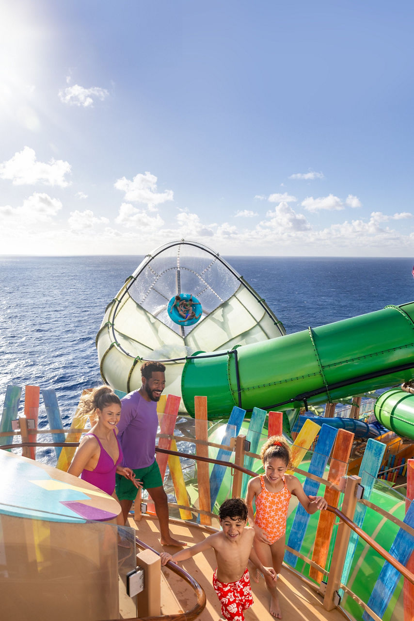 family walking up stairs thrills waterpark storm surge star of the seas