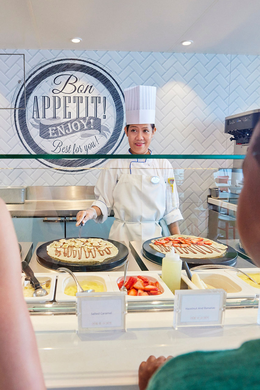 Chef offering creme dela crepe breakfast