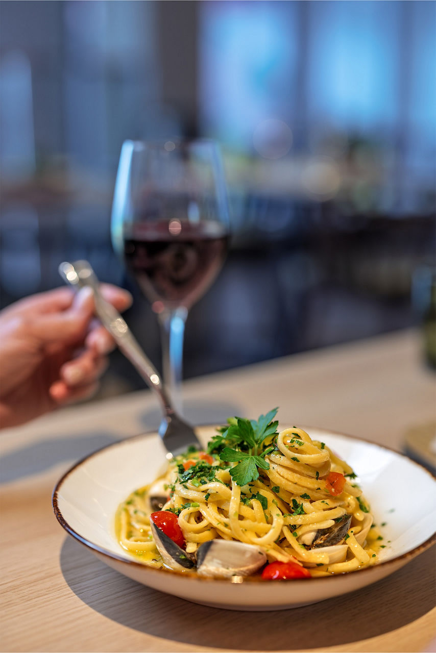 Seafood pasta and wine
