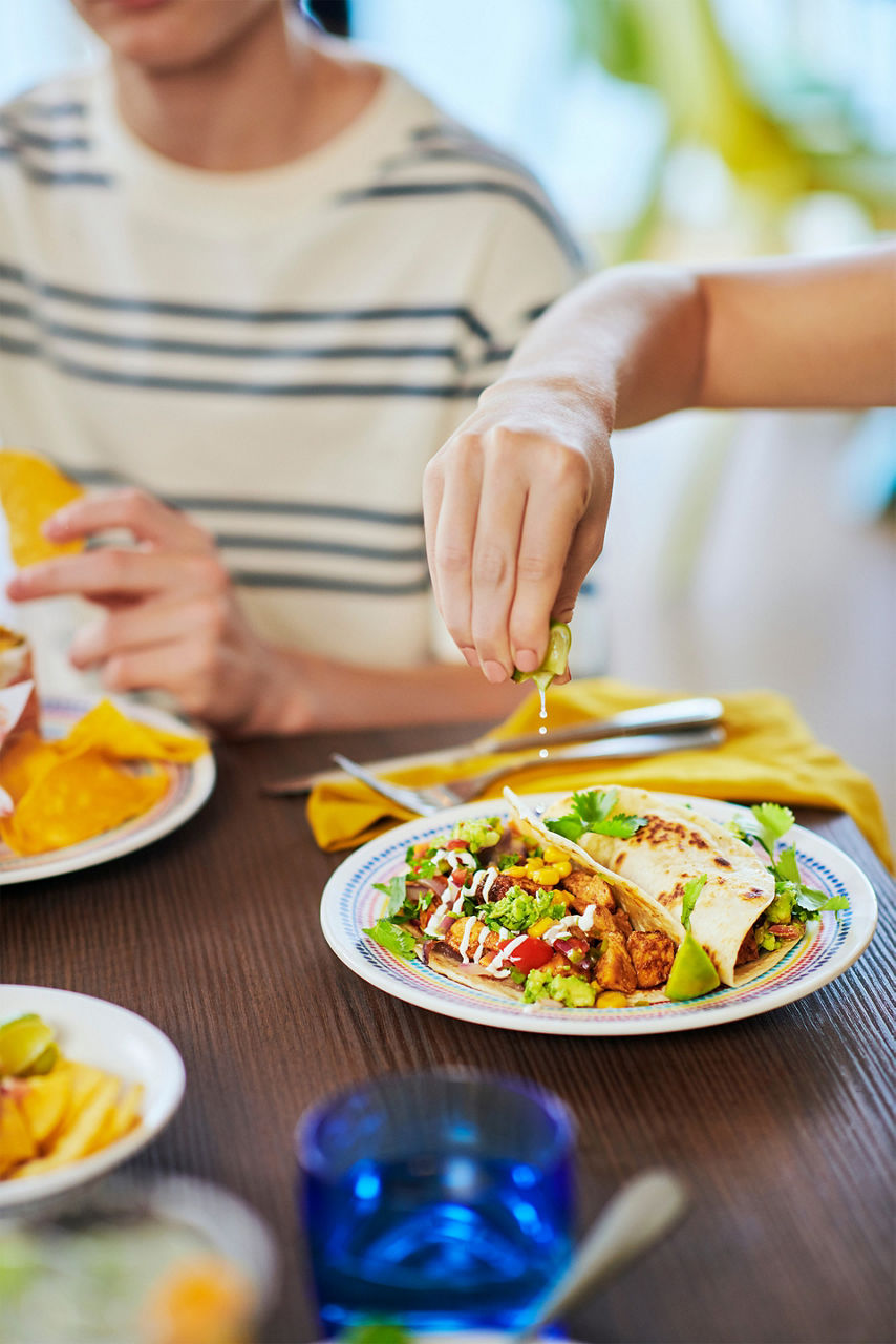 Squeezing lime on soft taco at El Loco Fresh