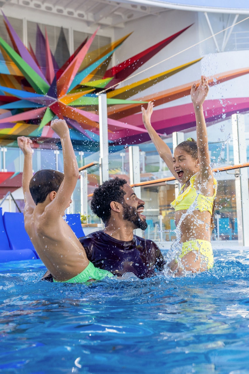 star of the seas royal bay pool father with children splashing crop