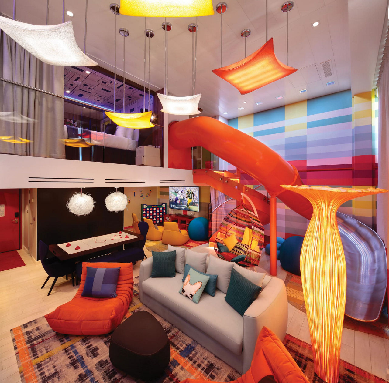 Ultimate Family Suite living area with lights on