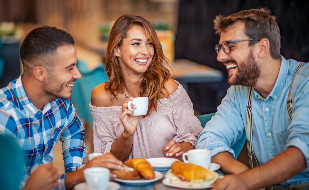 Group of friends having a coffee together.