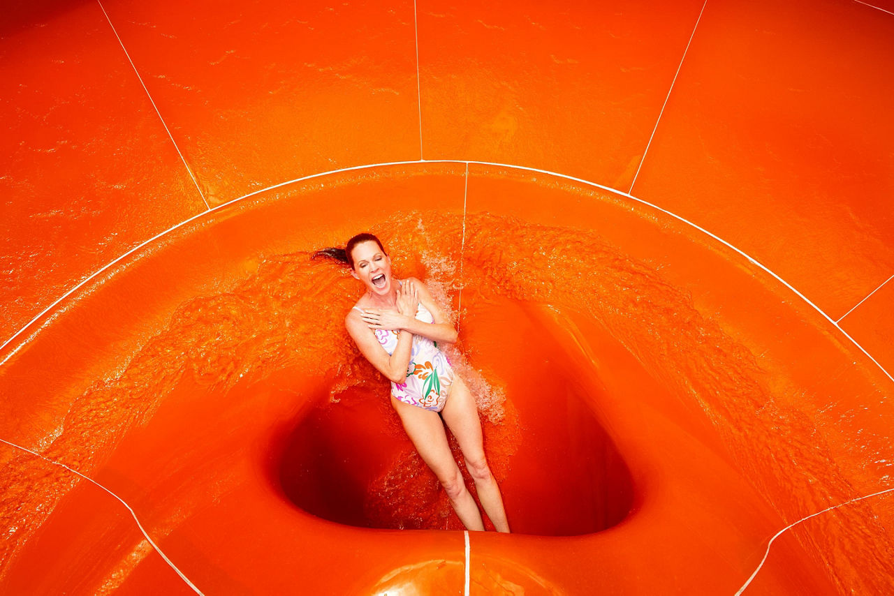 Woman Sliding Down the Perfect Storm Funnel
