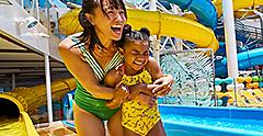 Mother and Daughter Enjoying Fun Water Activities Perfect Storm on Wonder of the Seas Royal Caribbean