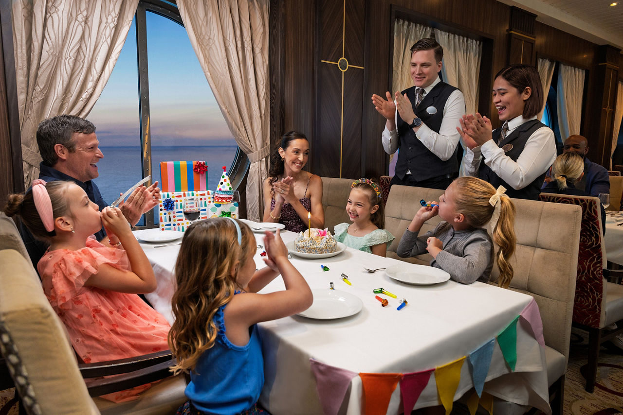 Family celebrating child's birthday in Main Dining Room
