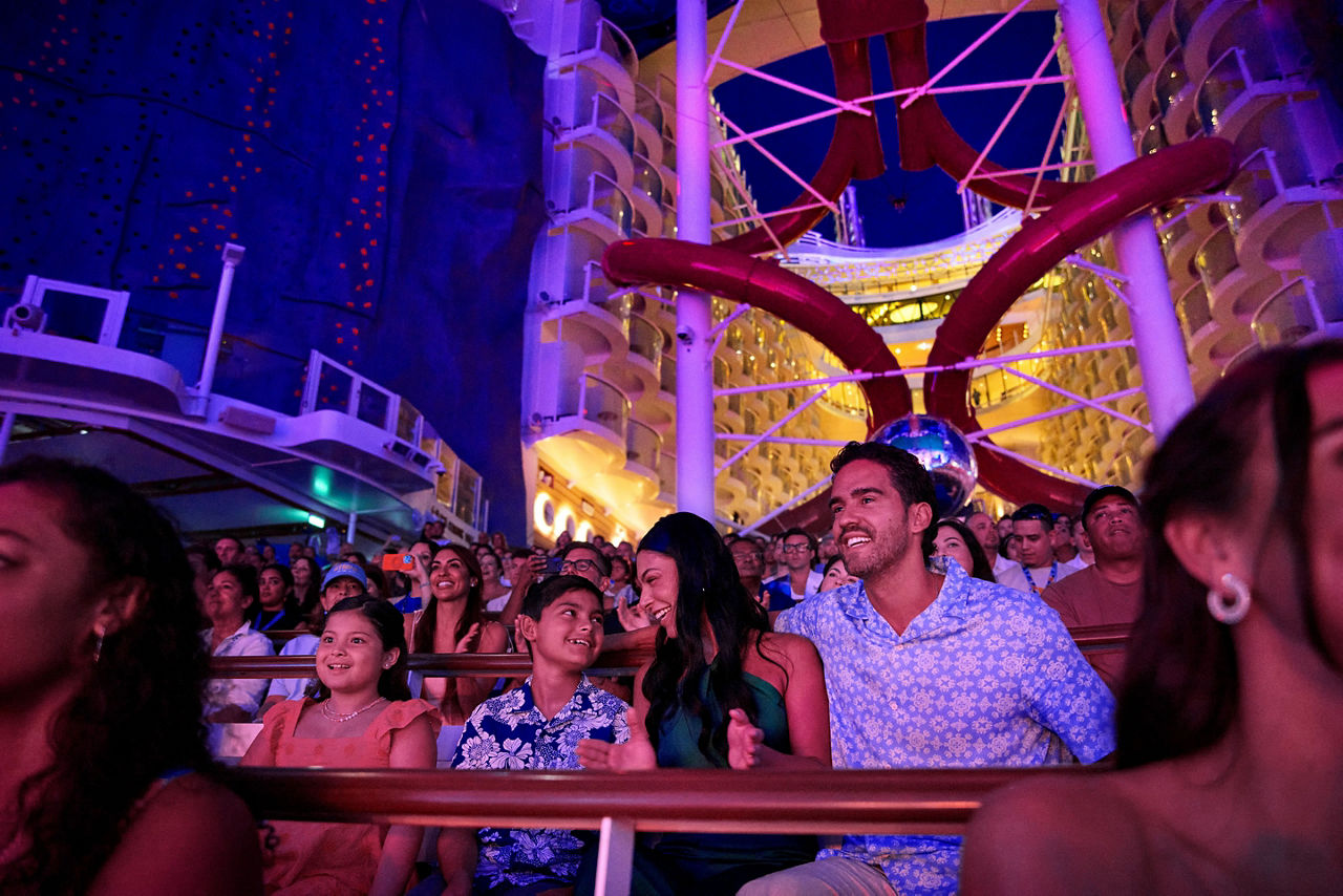 AquaTheater, family having fun in audience at AquaTheater show