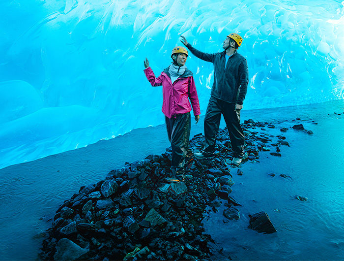 Couple walking at a Glacier in Alaska