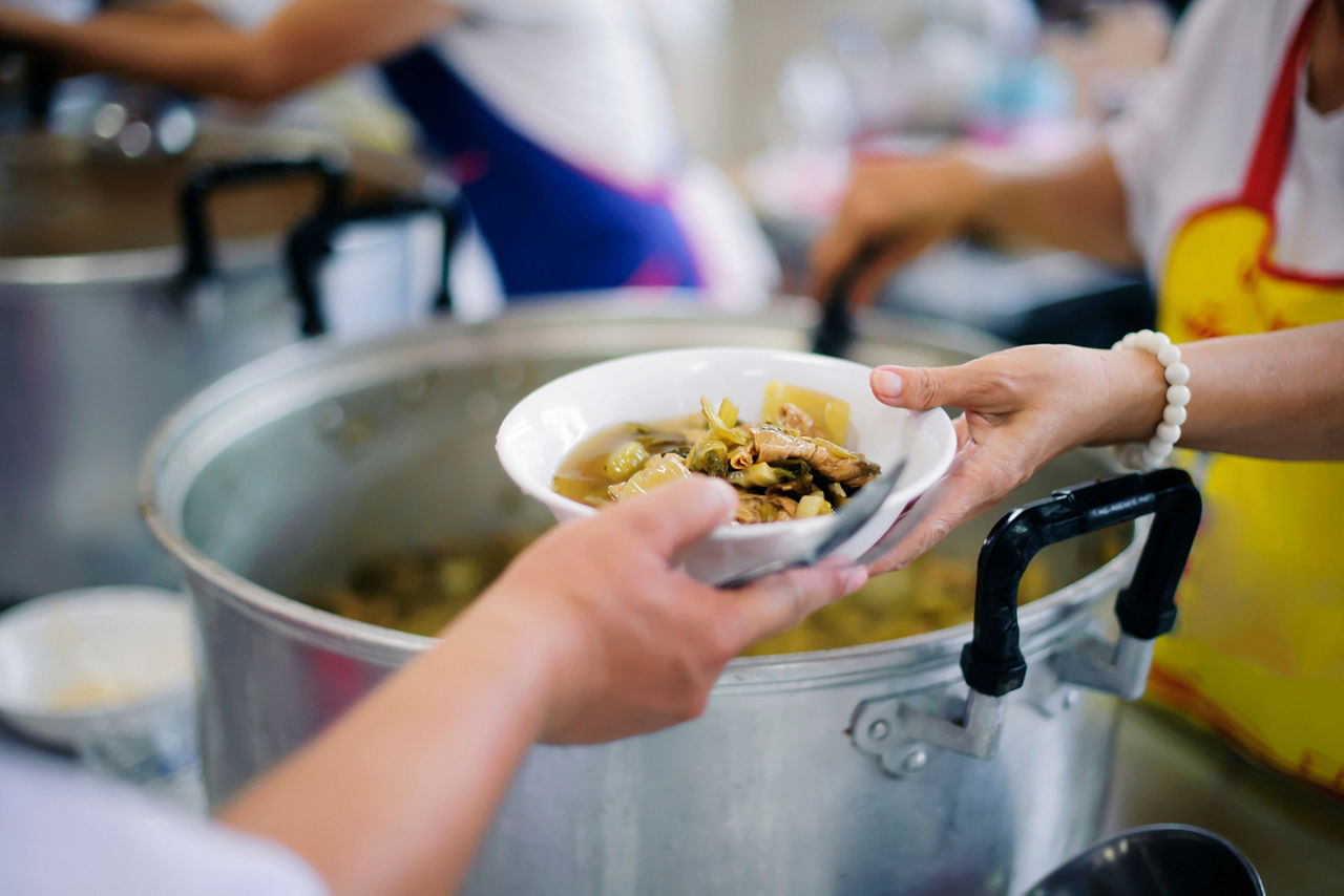 Giving Back to the Community by Volunteering at a Soup Kitchen
