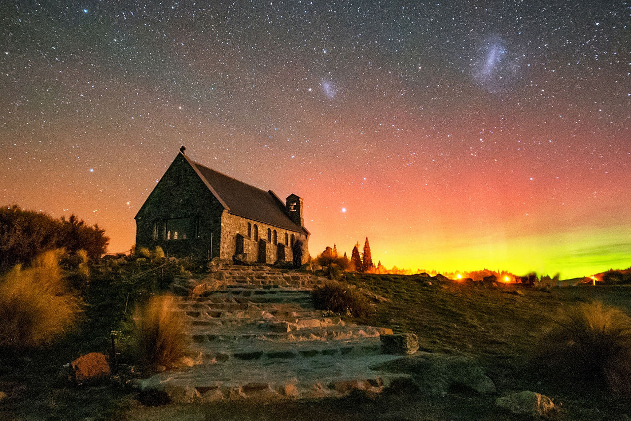 old brick church at night in the winter with the Southern Lights. Australia.