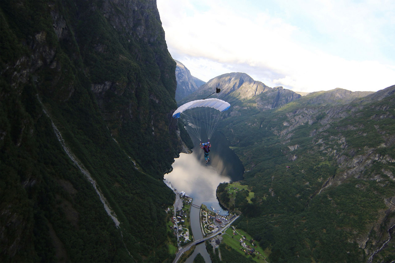 skydiver parachuting over beautiful views. Norway.