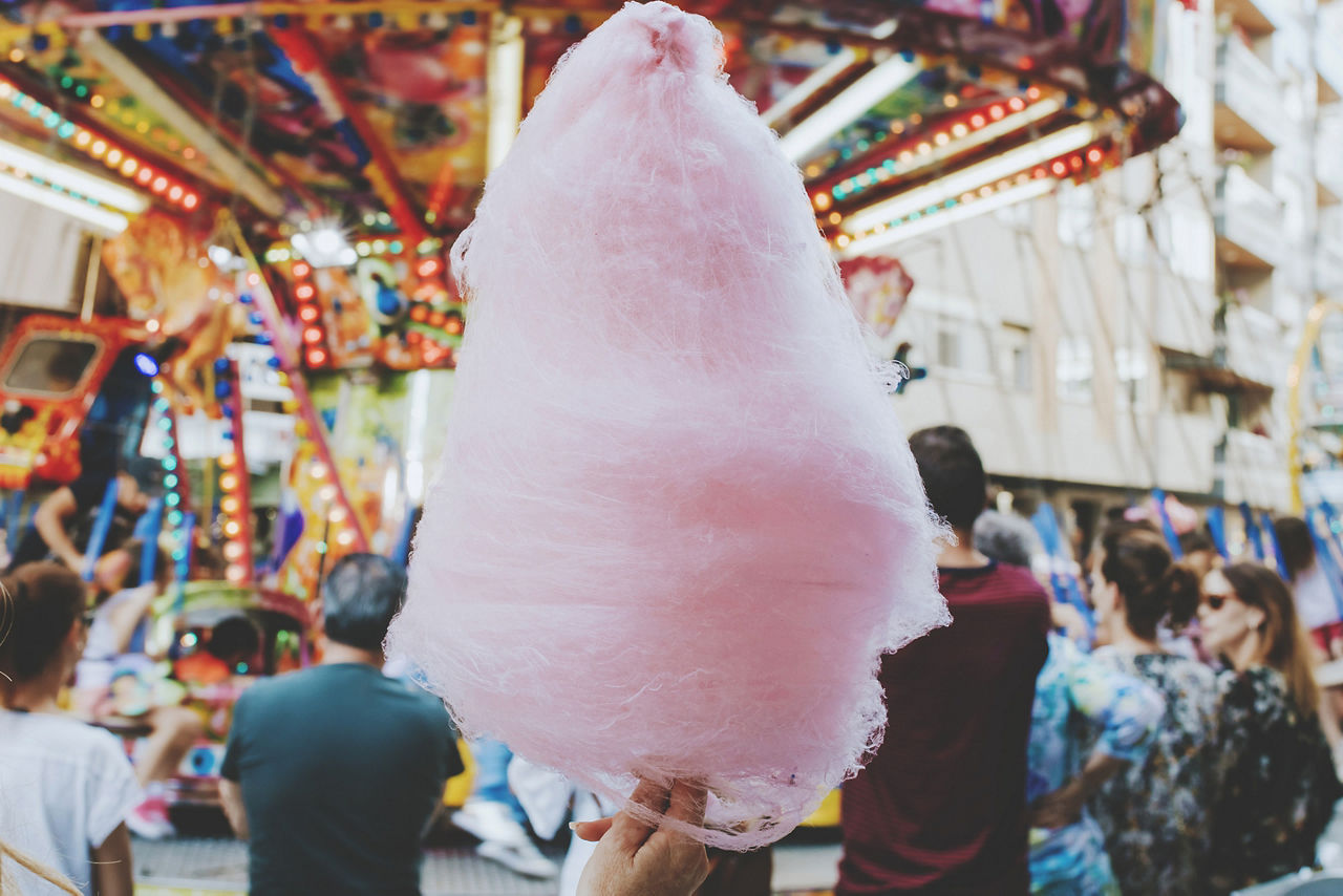 Hand Holding Pink Cotton Candy 