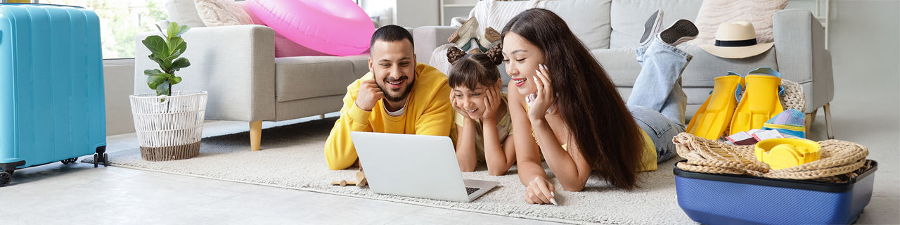 Family of using laptop at home