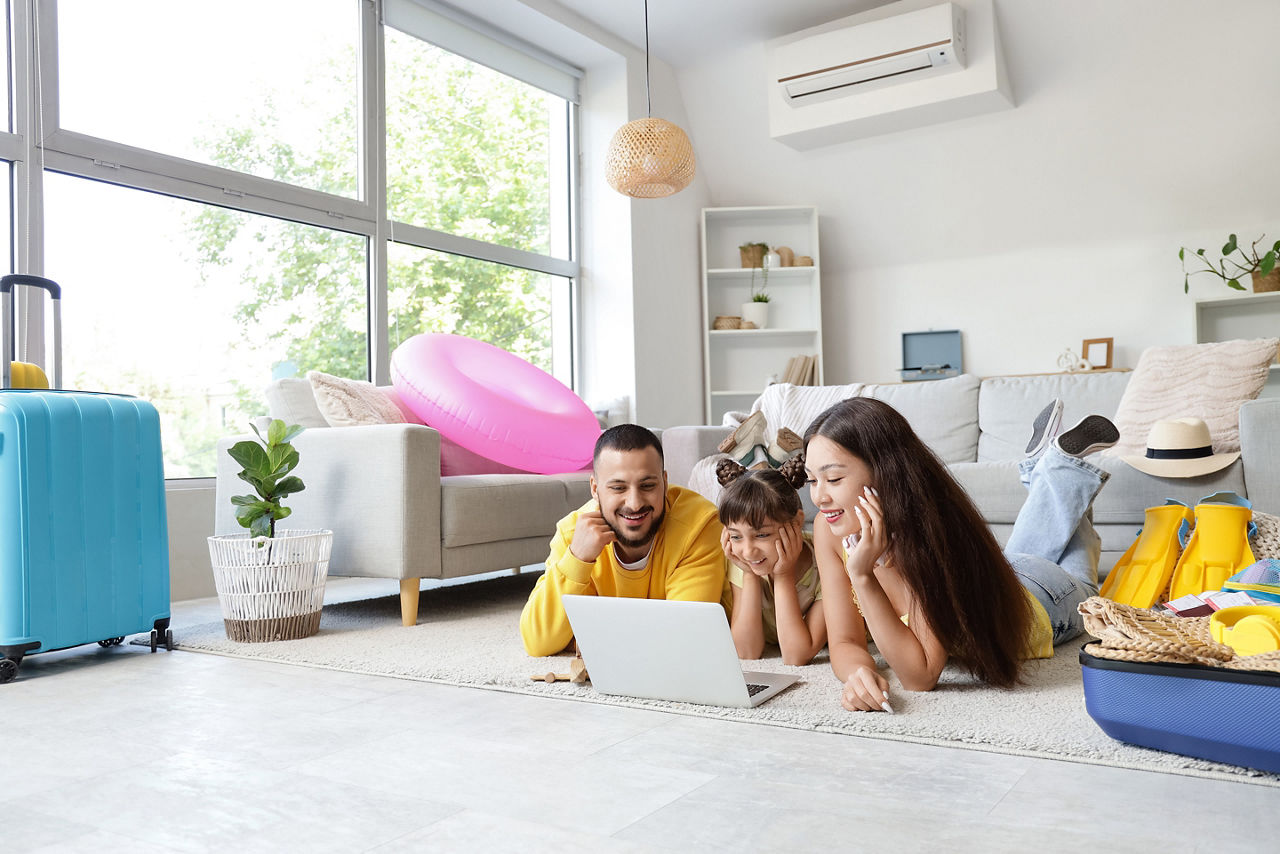 Family of using laptop at home