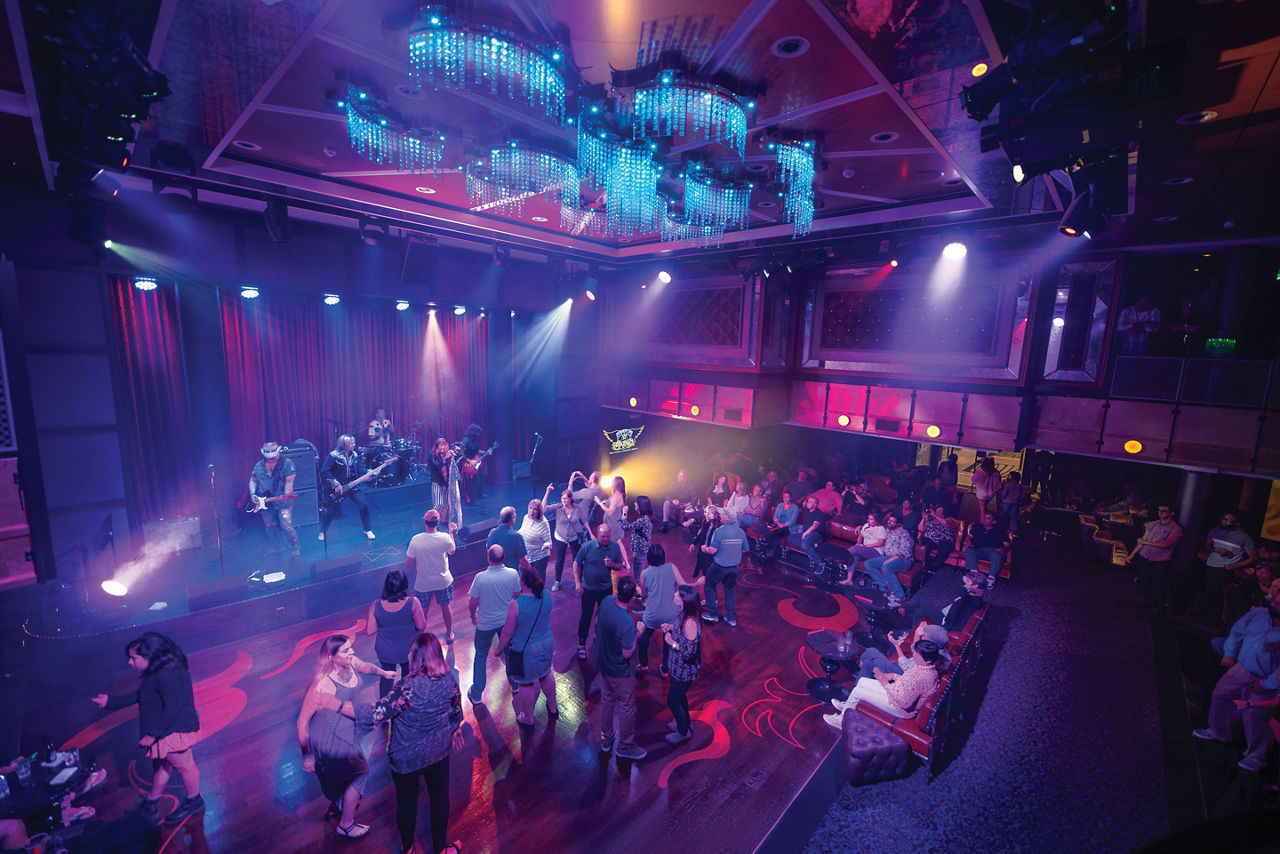 Audience Enjoying at Live Band Playing at The Music Hall