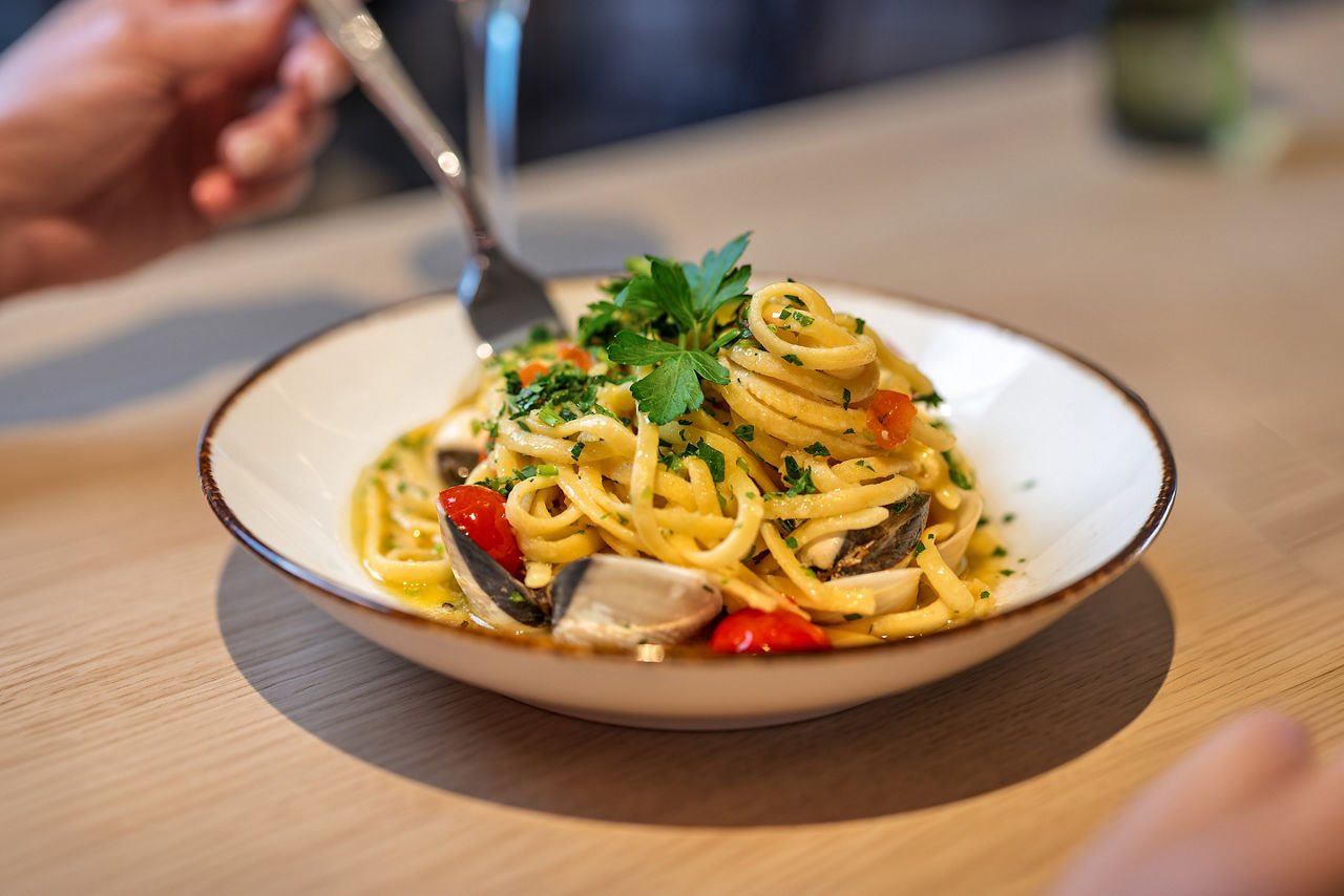 Seafood pasta and wine at Giovanni's Italian Kitchen and Wine Bar, noodles, spaghetti, Italian cuisine,