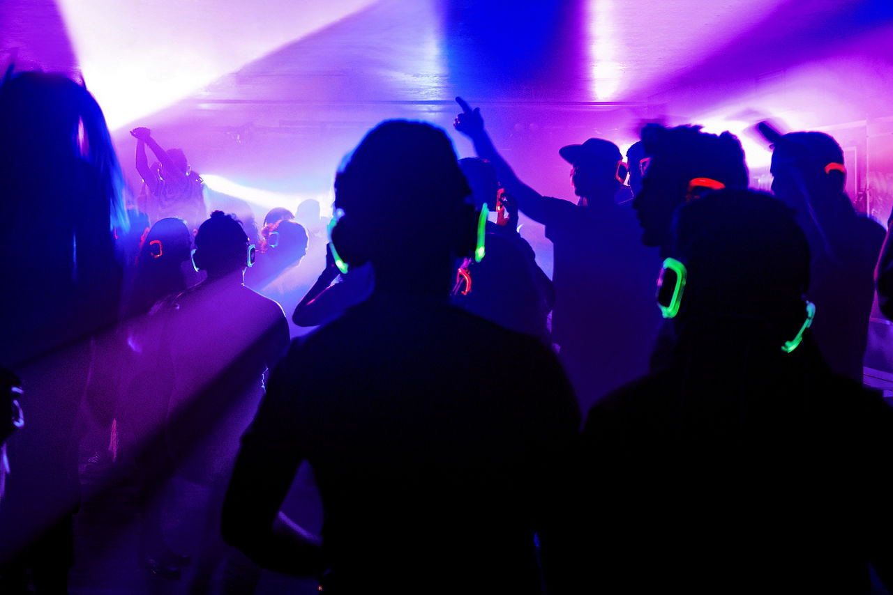 Friends Enjoying a Night at the Silent Disco 