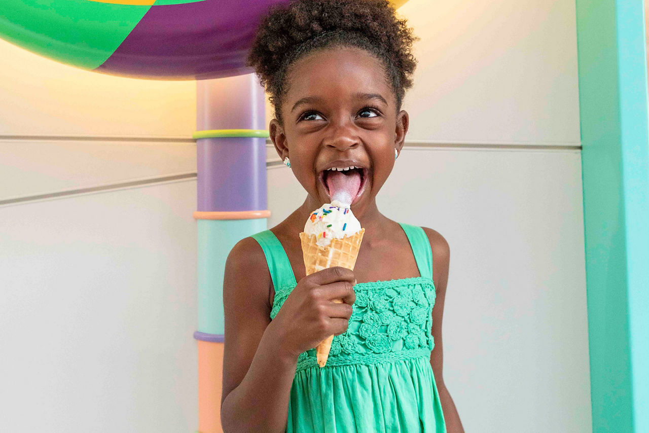 Sugar Beach Girl Eating Ice Cream by the Entrance