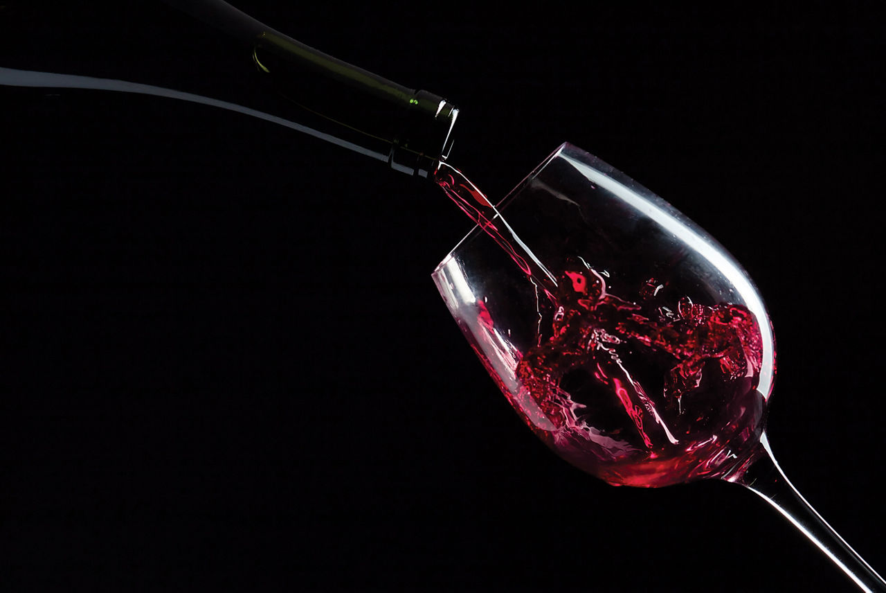 Red Wine being Poured at Vintages