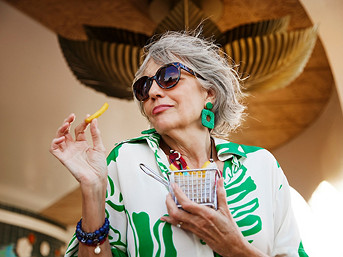woman enjoying her food tev