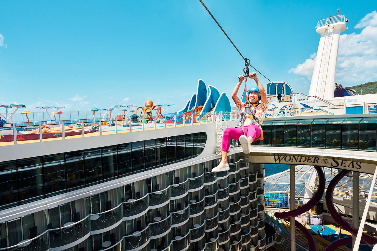 Oasis Class, Wonder of the Seas, Zip Line Kid Going Over the Boardwalk