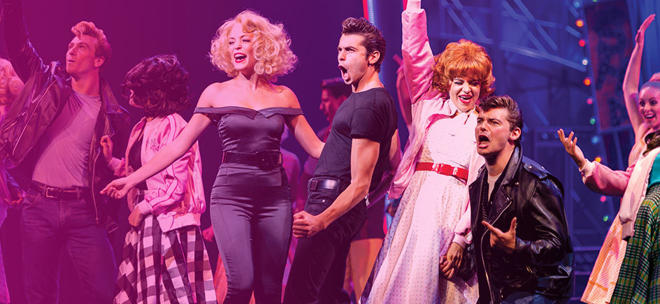 Grease cast performing during a Broadway cruise show.