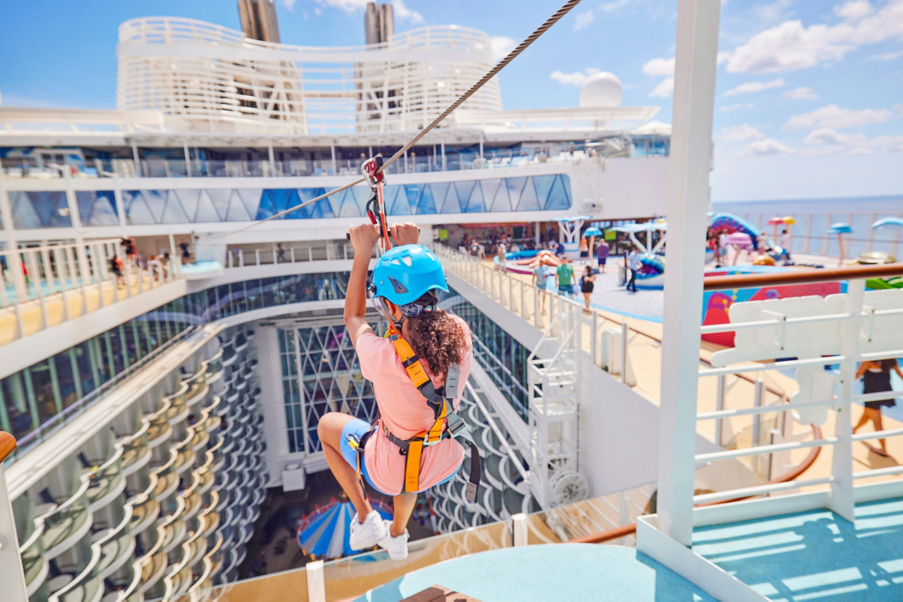 Woman Enjoying the Boardwalk View on the Zipline