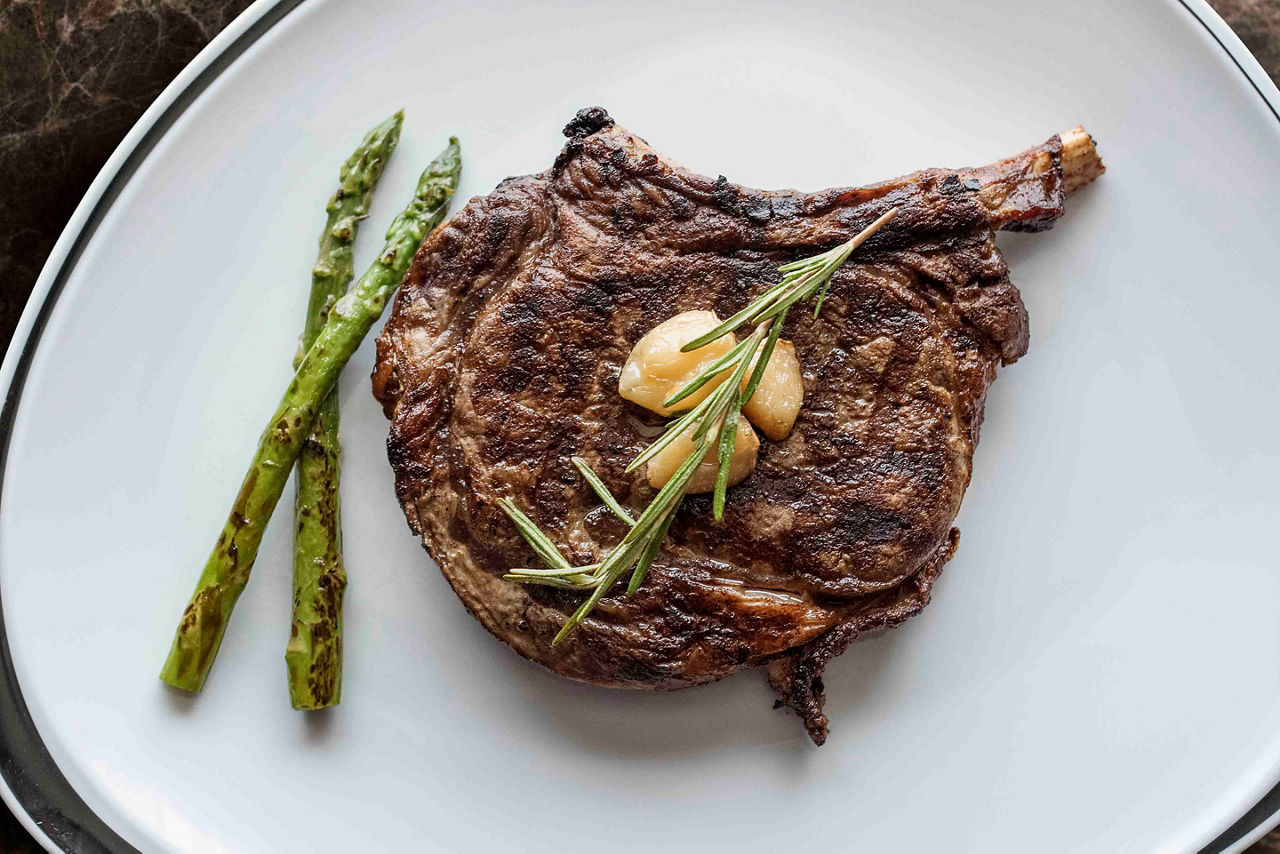 Chops Grille Steak Asparagus Close Up