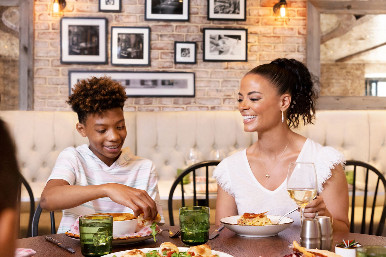 Mother and Son Dinning at Giovanni's Table