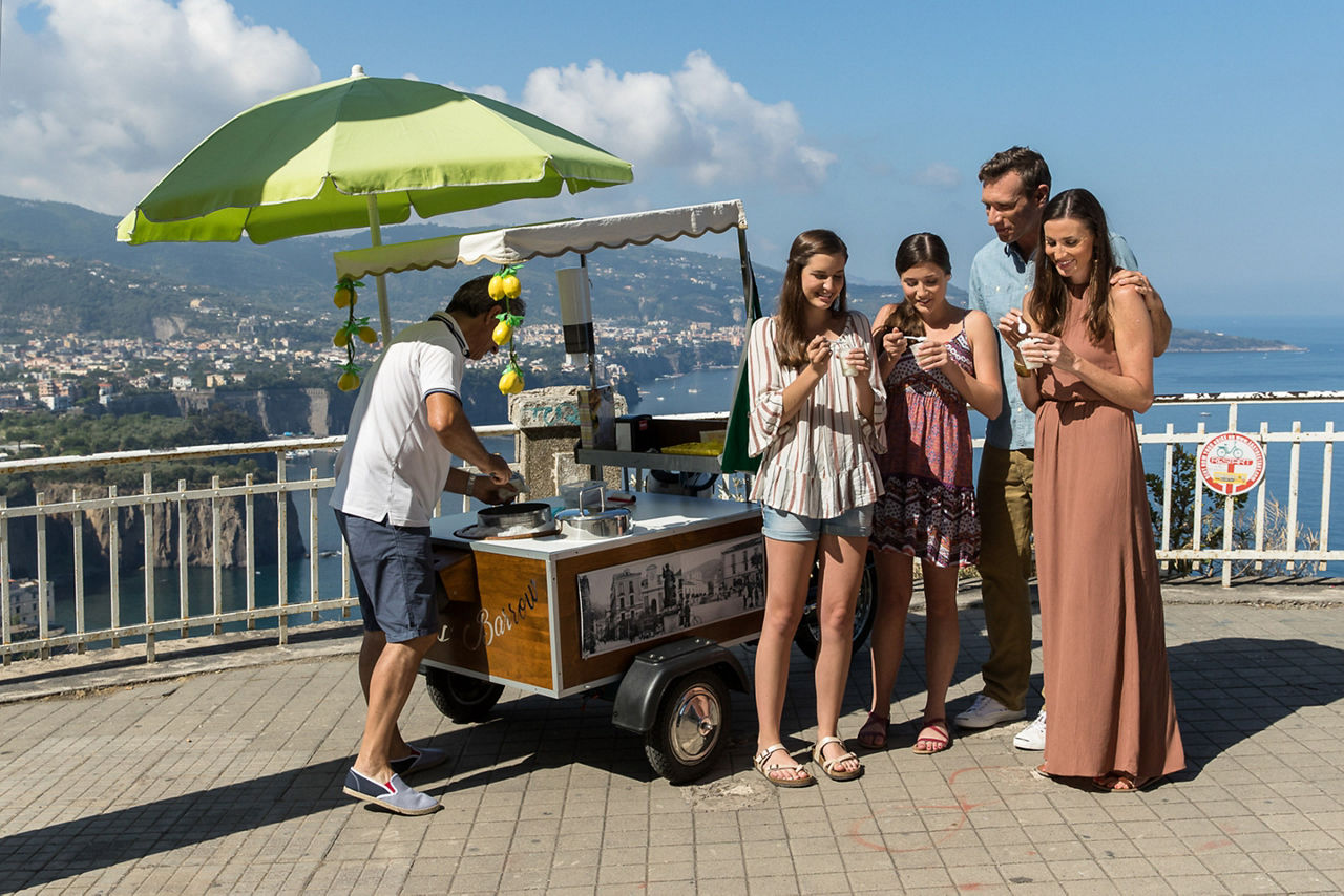 Family Enjoying Limoncello on the Coast of Amafi