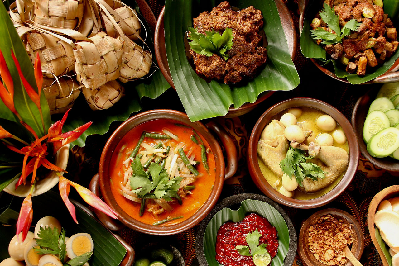 Ketupat Lebaran. Traditional Celebratory Dish of Rice Cake with Several Side Dishes