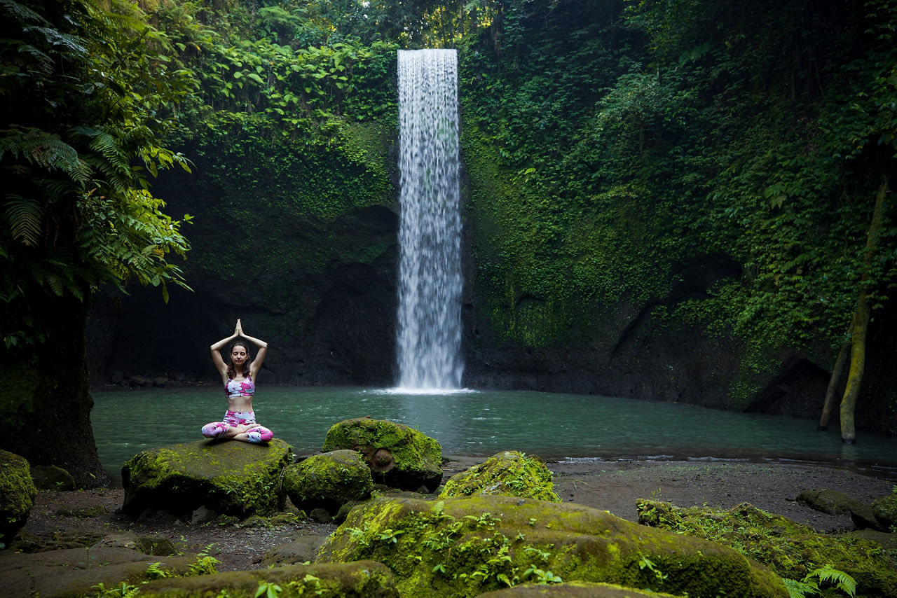 Yoga in the green forest. Bali, Indonesia.