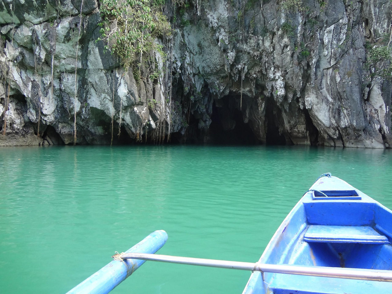 On a kayak about to enter an underwater cave in Boracay, Phillippines