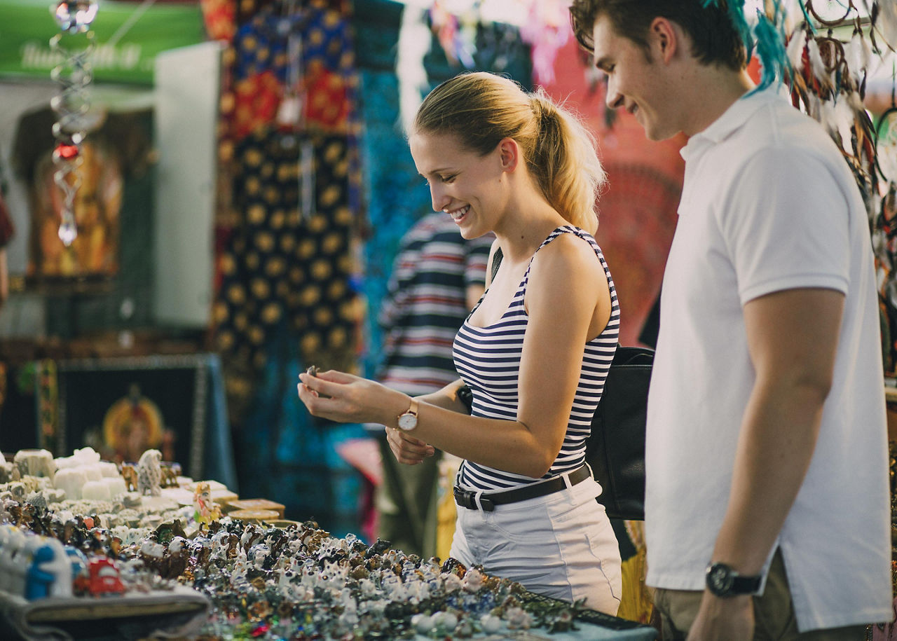 A young couple shopping at a market