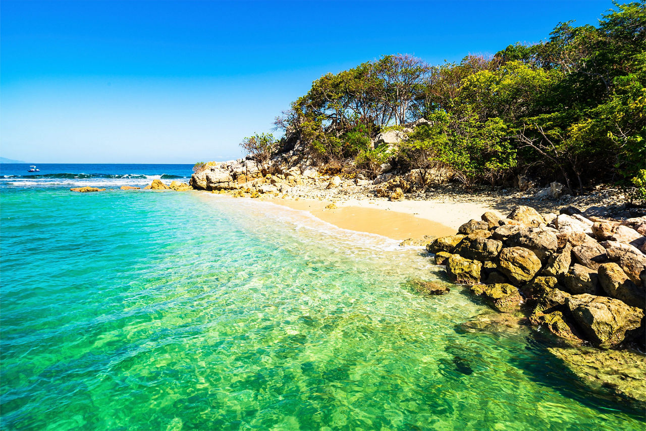 Idyllic beach in Labadee Island. Haiti. Caption: Labadee's beaches are known for their jewel-bright, crystal-clear waters. 