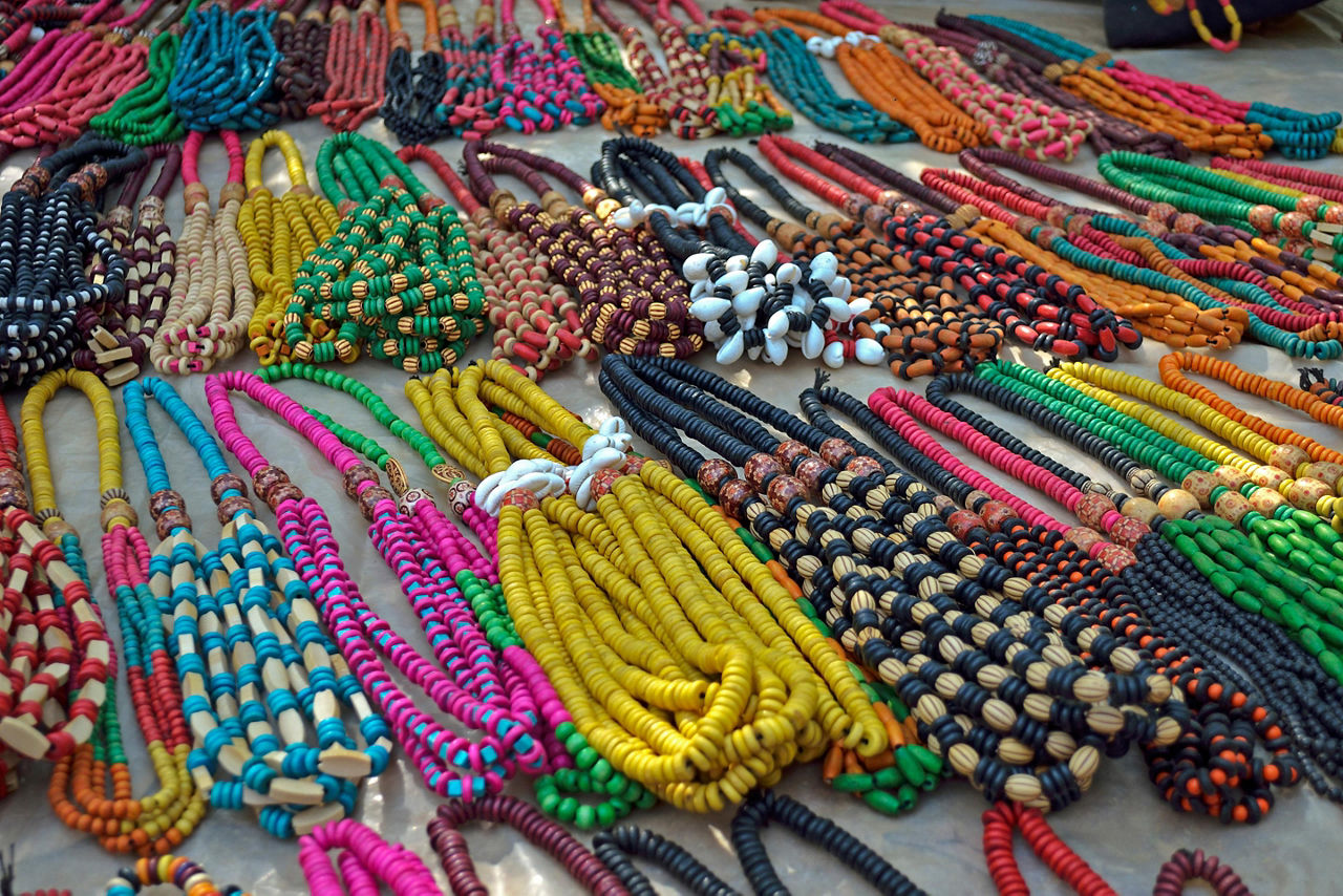 An assortment of colorful necklaces for sale