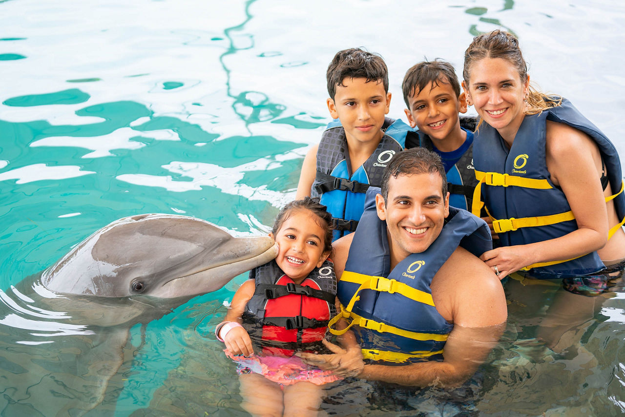 Family Posing with a Dolphin, Nassau, Bahamas