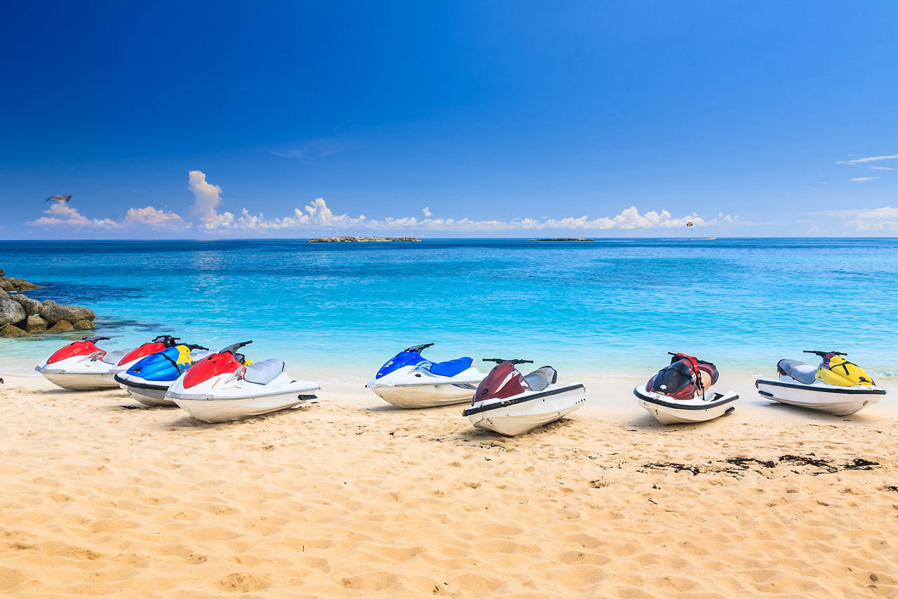 Jet Skis Lining a White Sandy Beach, Nassau, Bahamas