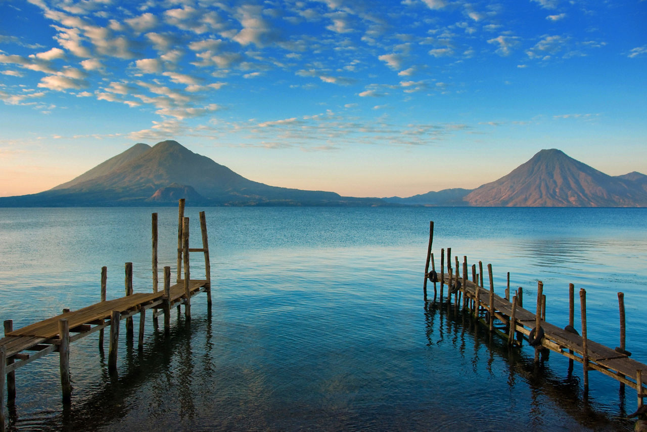 Shore docks view with volcanoes in Background