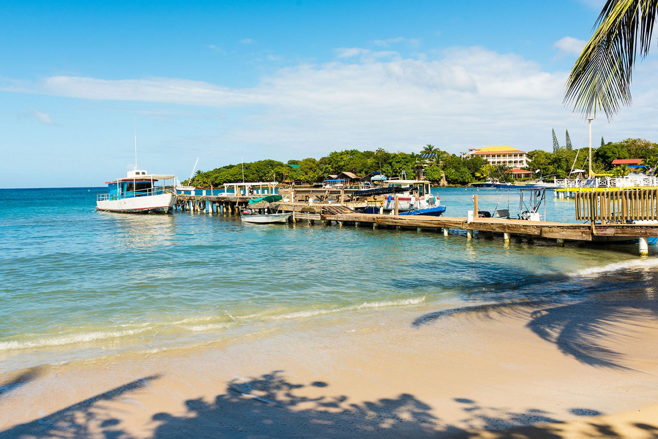 Pier with Water Taxis at the West End Village,  Roatan, Honduras