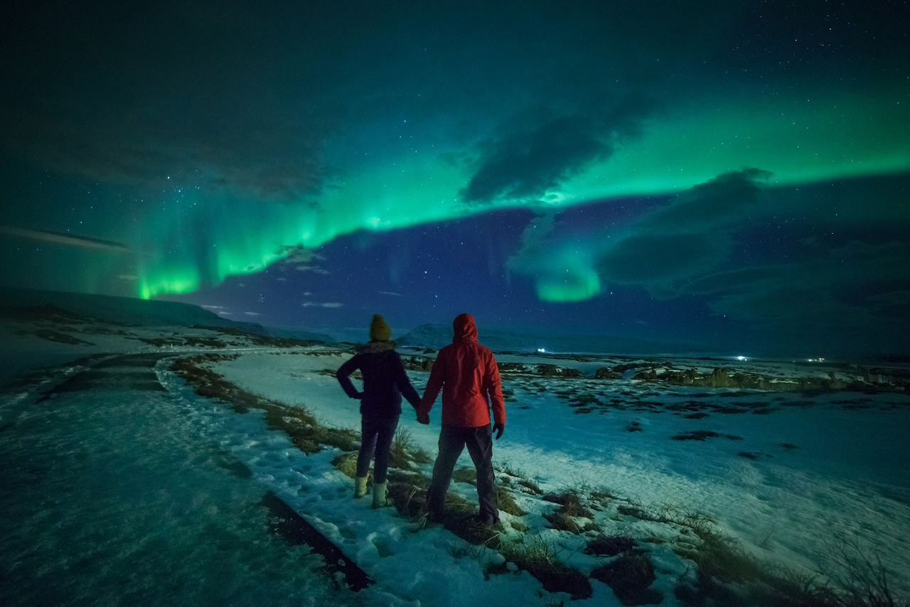 Alaska Fairbanks Northern Lights Couple Enjoying Night Sky