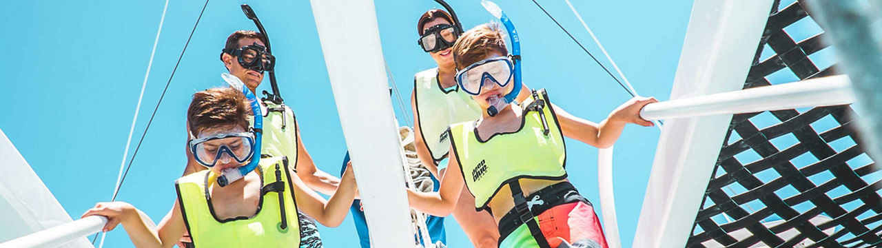 family snorkeling caribbean cruise