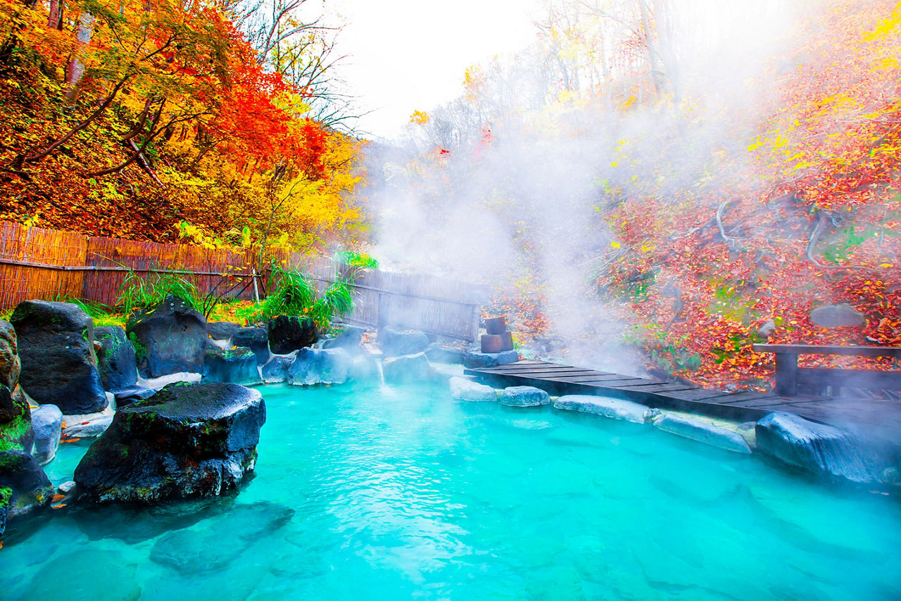 Japanese hot springs surrounded by fall leaves fall in Yamagata. Japan